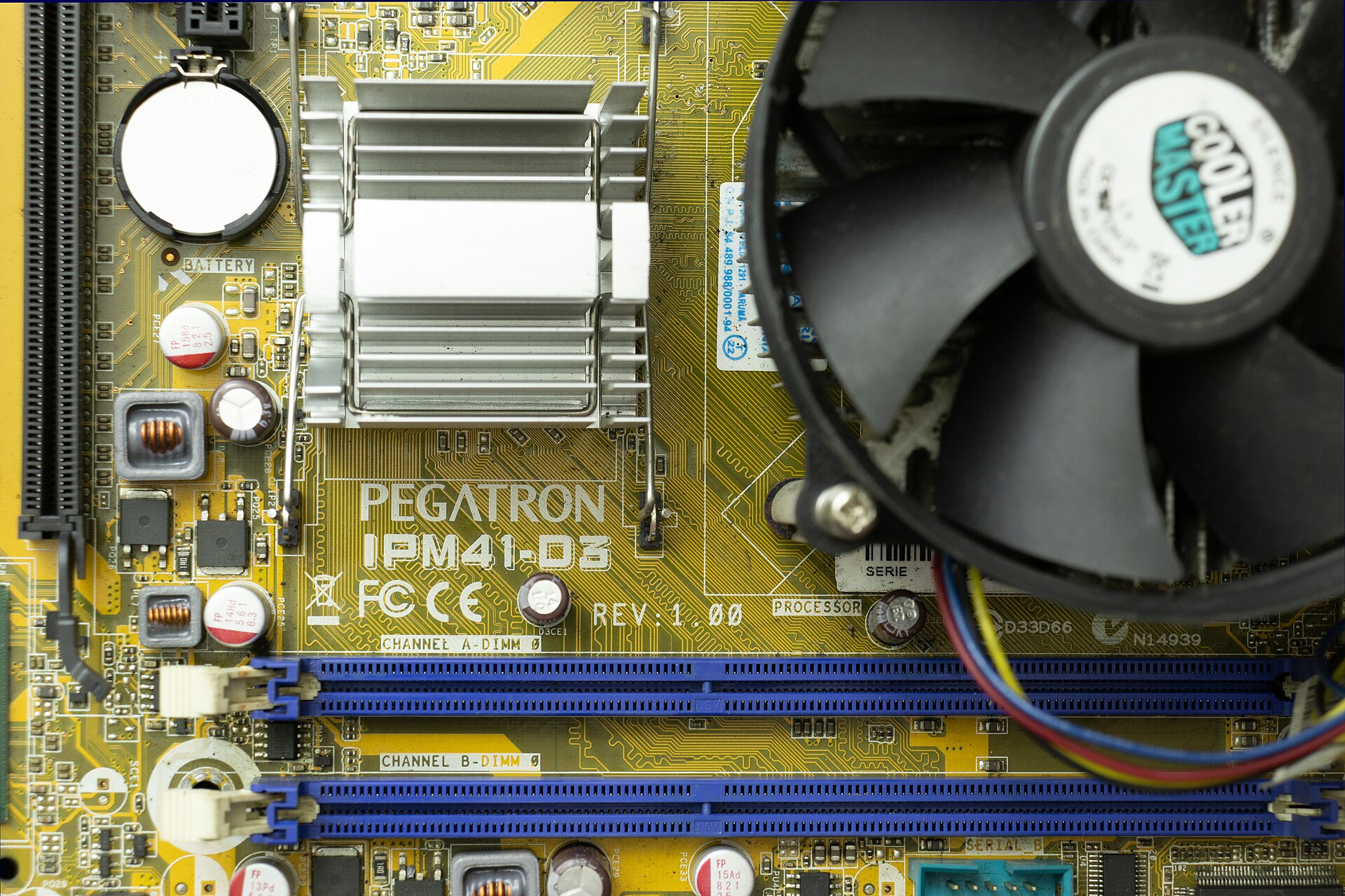Computer motherboard with RAM slots and expansion ports